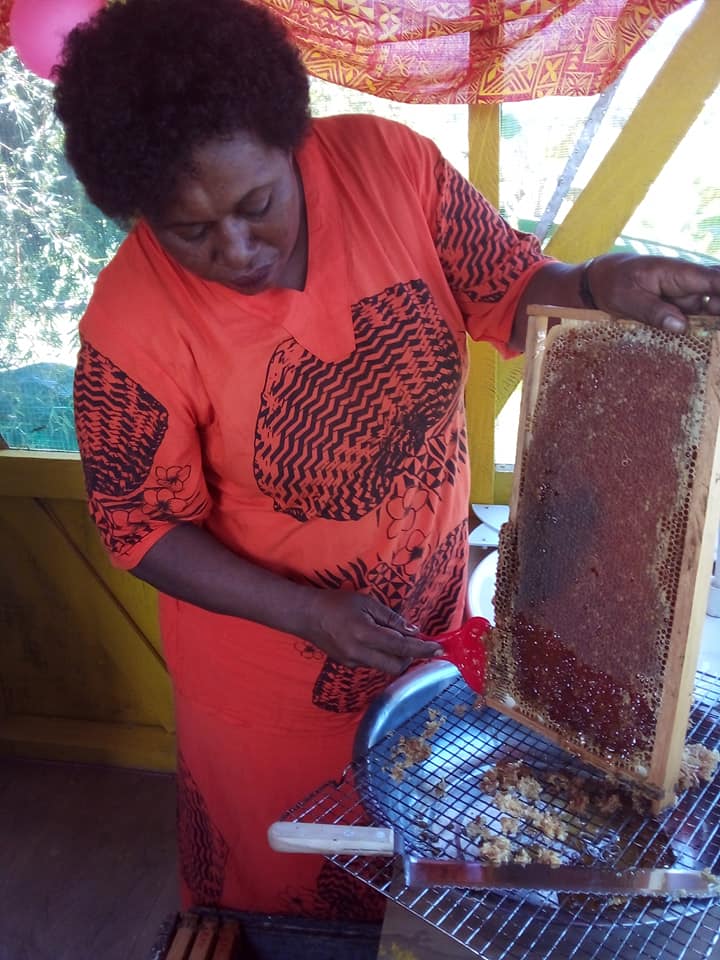 pacific islands woman beekeeper honey natural