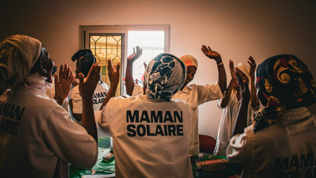 Solar engineers training at Barefoot College International in Senegal celebrate and dance 