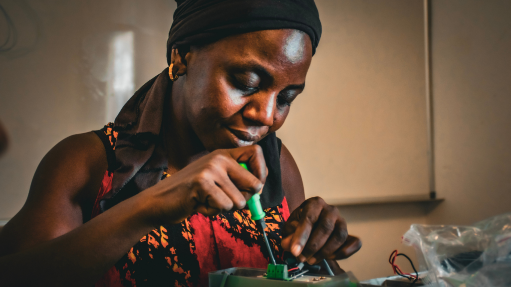Solar engineer from Senegal learns to build solar technical equipment at Barefoot College International in Senegal. She is learning by doing.